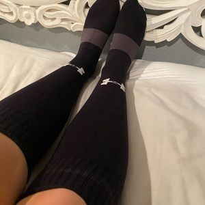 Black under armour softball socks.